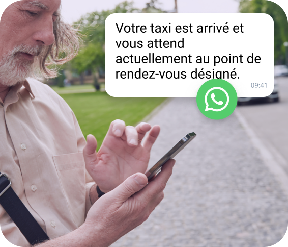Modèle WhatsApp TopMessage informant un contact de l’heure et du lieu d’arrivée de son taxi.